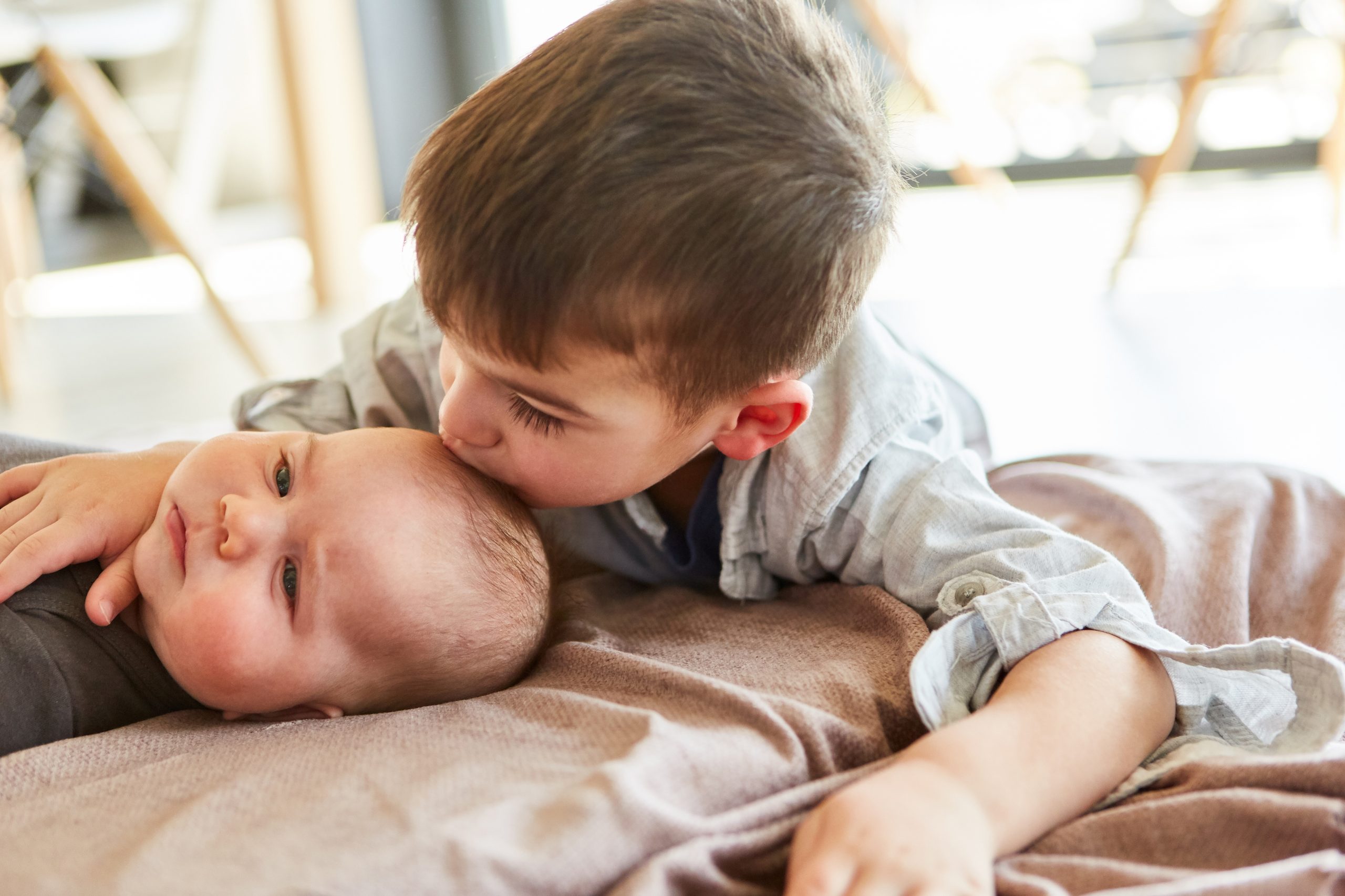 Little,Boy,As,Big,Brother,Gives,Baby,A,Kiss,On